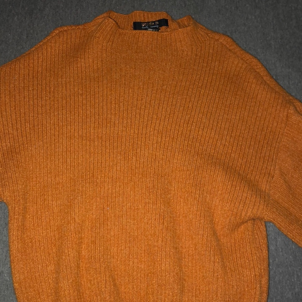 a yellow cute, sort of cropped sweater!!!